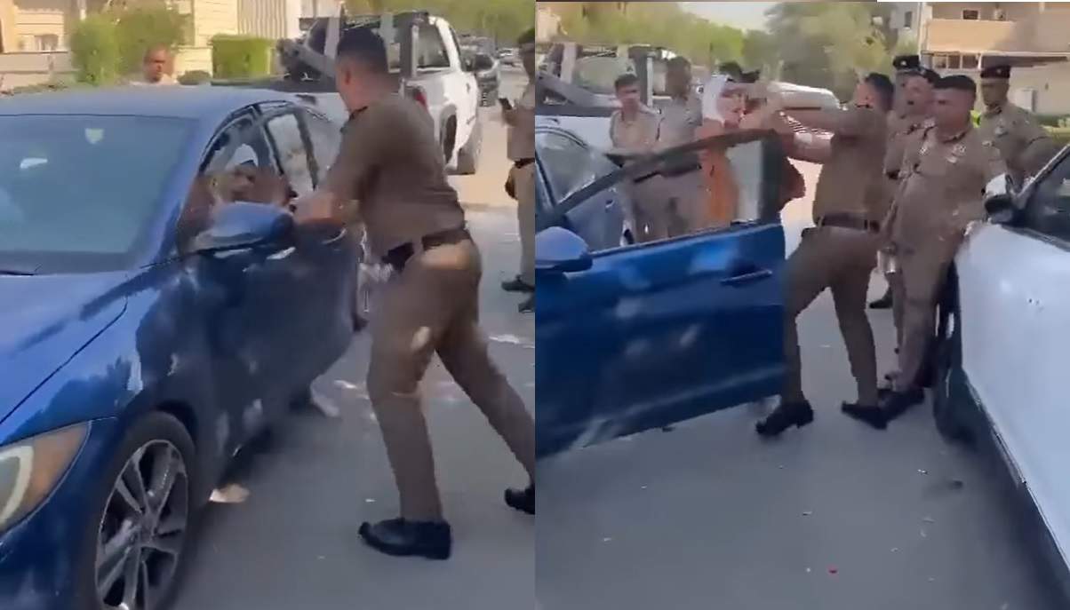ضابطة عراقية بزي مدني تخرج من سيارتها وتتعارك مع ضباط شرطة.. ما القصة؟